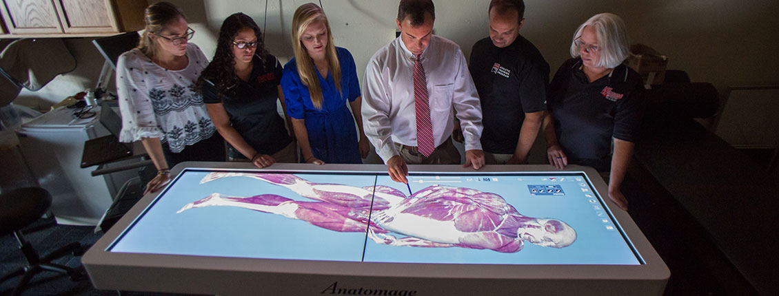 Students and faculty using the Anotomage table