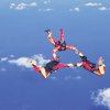 Three people skydiving